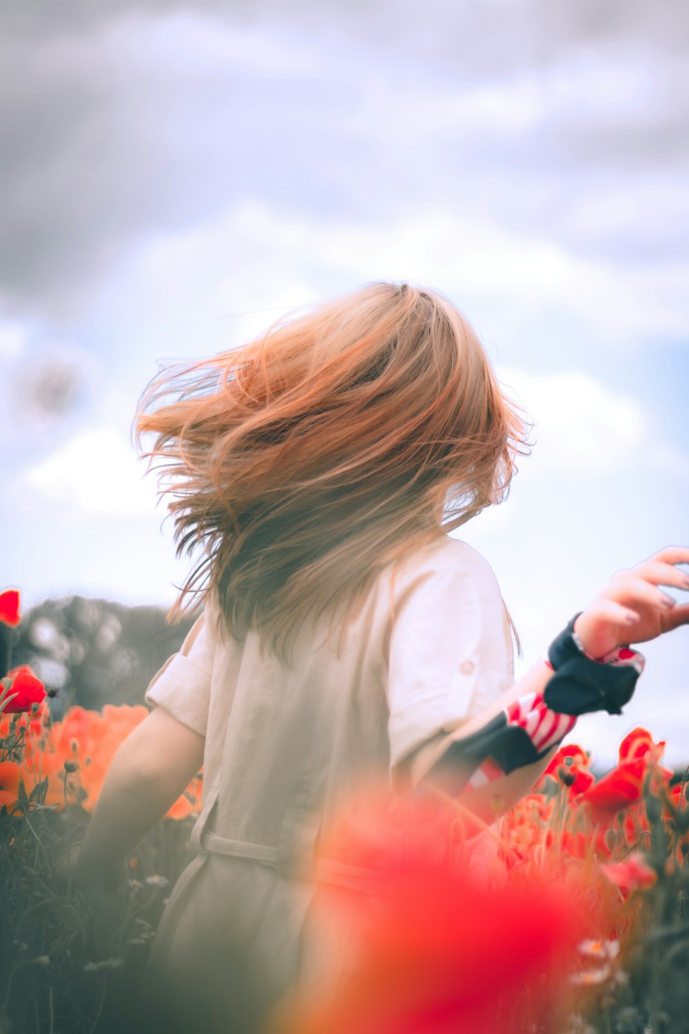 a woman holding flowers