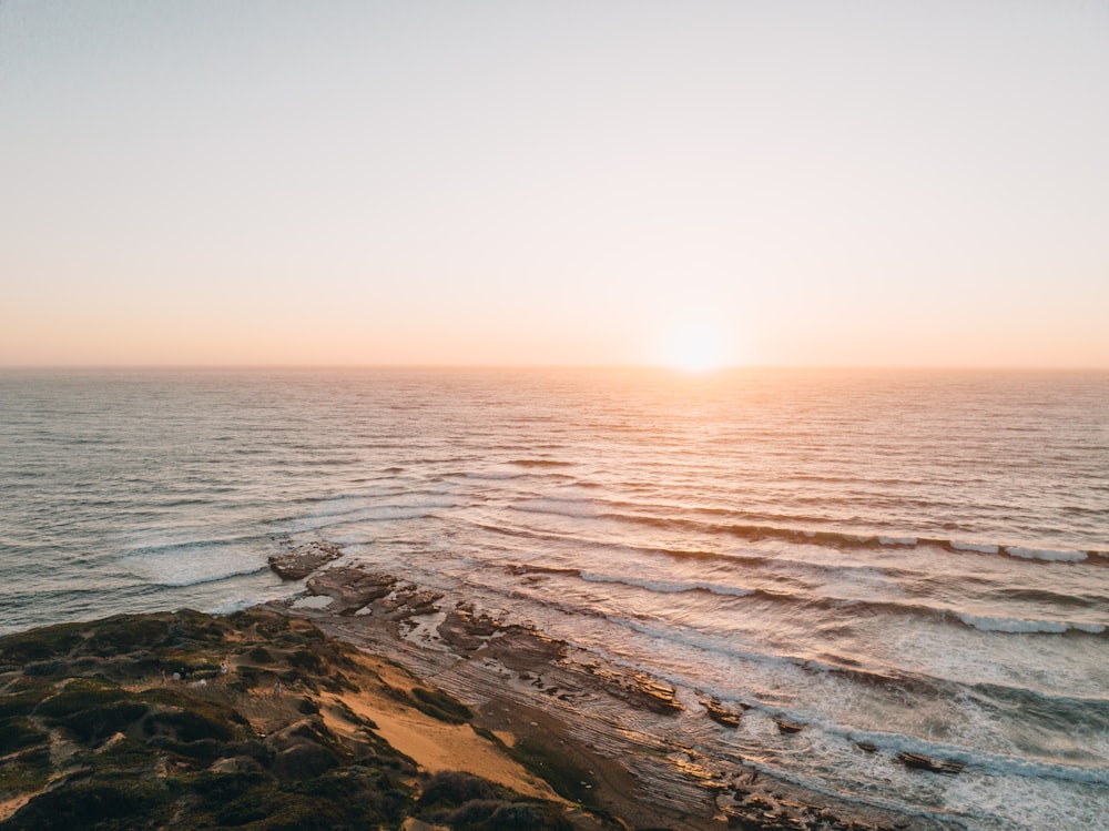 a rocky beach with waves