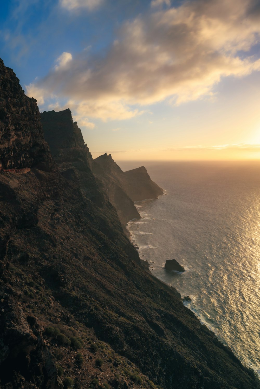 a rocky cliff overlooking the ocean