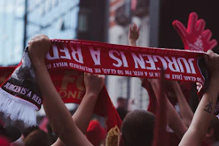 a group of people holding a sign