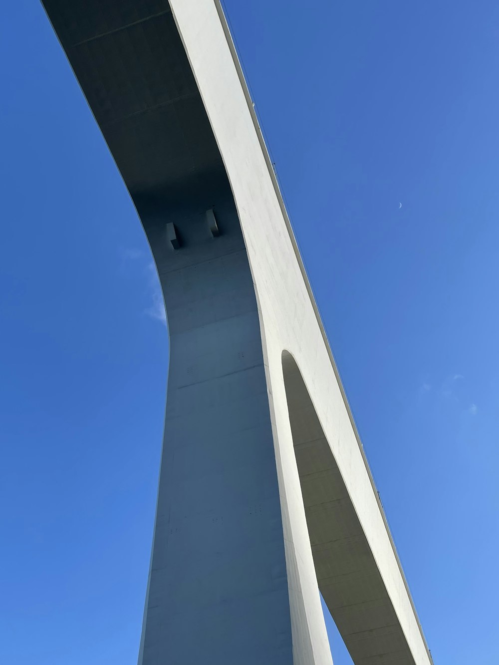 a tall white bridge