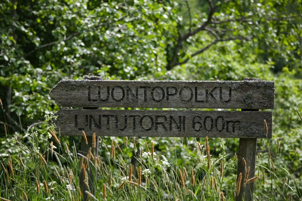 a sign in the woods