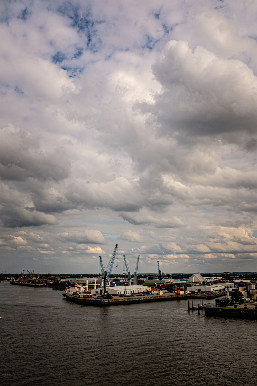 a large ship docked at a pier