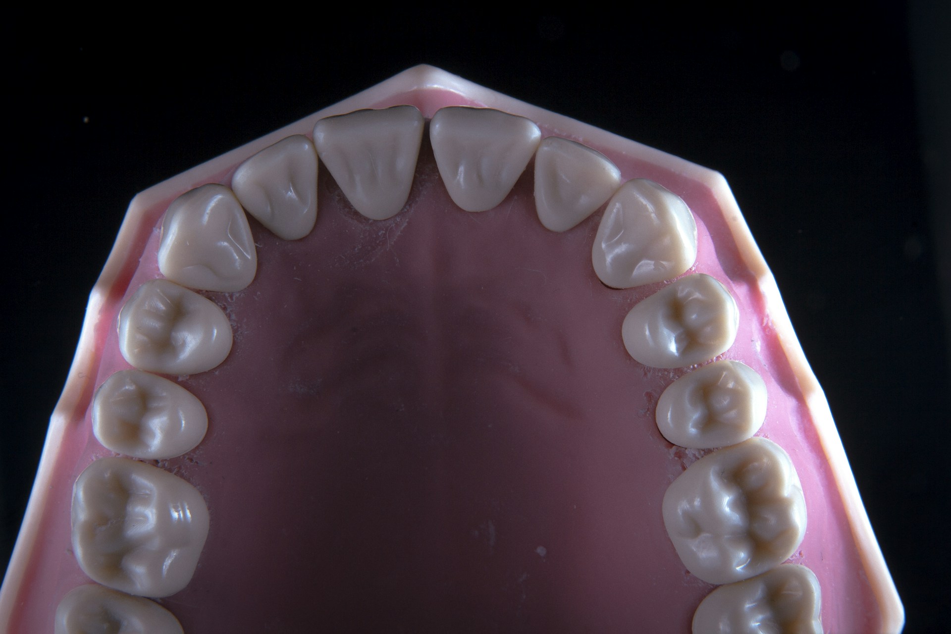 a close-up of a pink pill