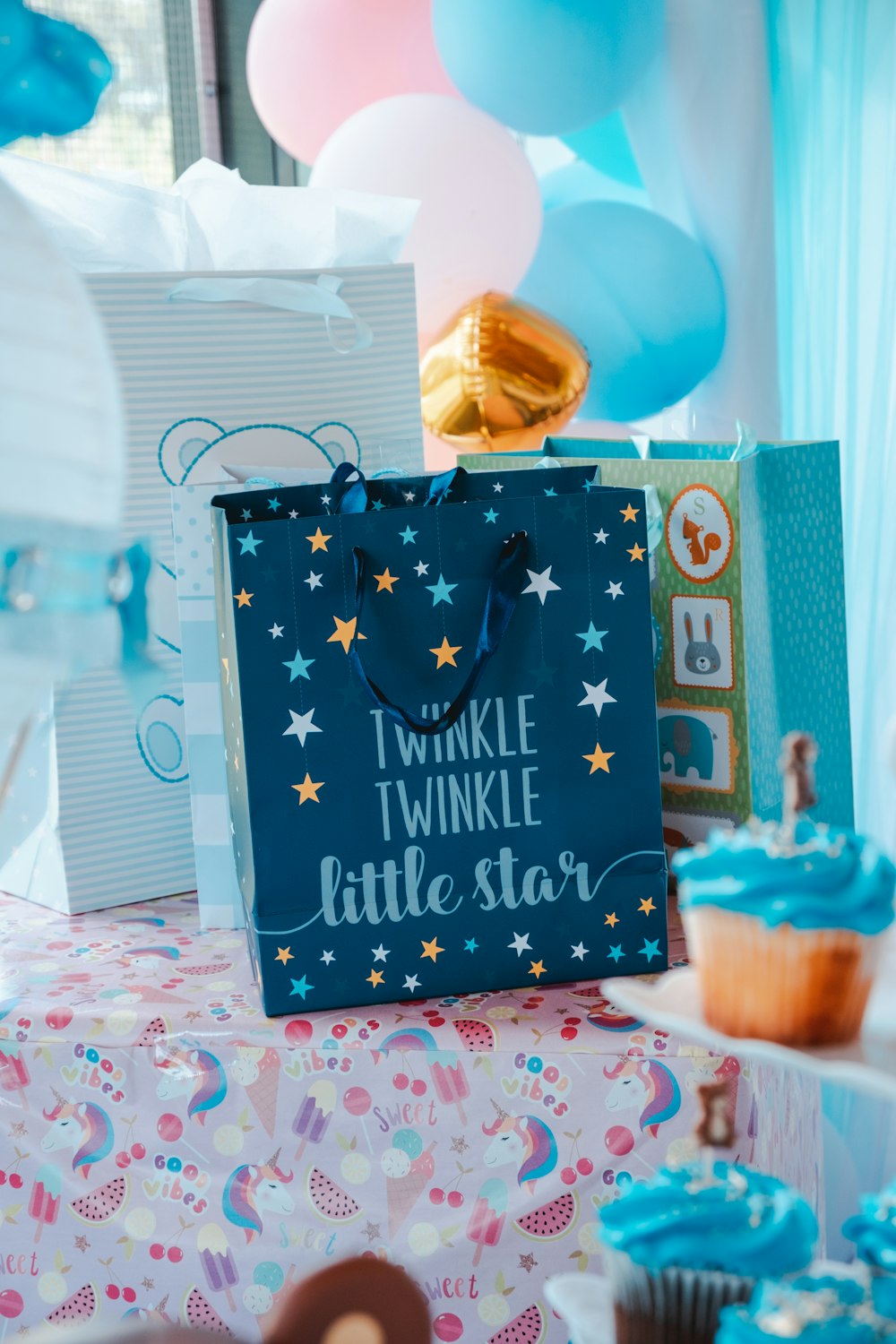 a birthday cake with a blue and white sign