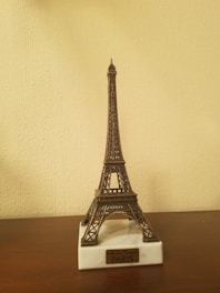A detailed 3D printed miniature of Paris skyline with the Eiffel Tower prominently featured.