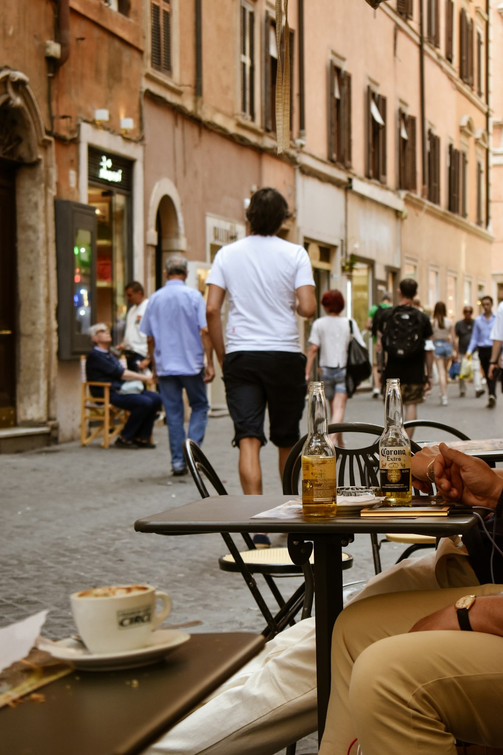 a group of people walking on a street