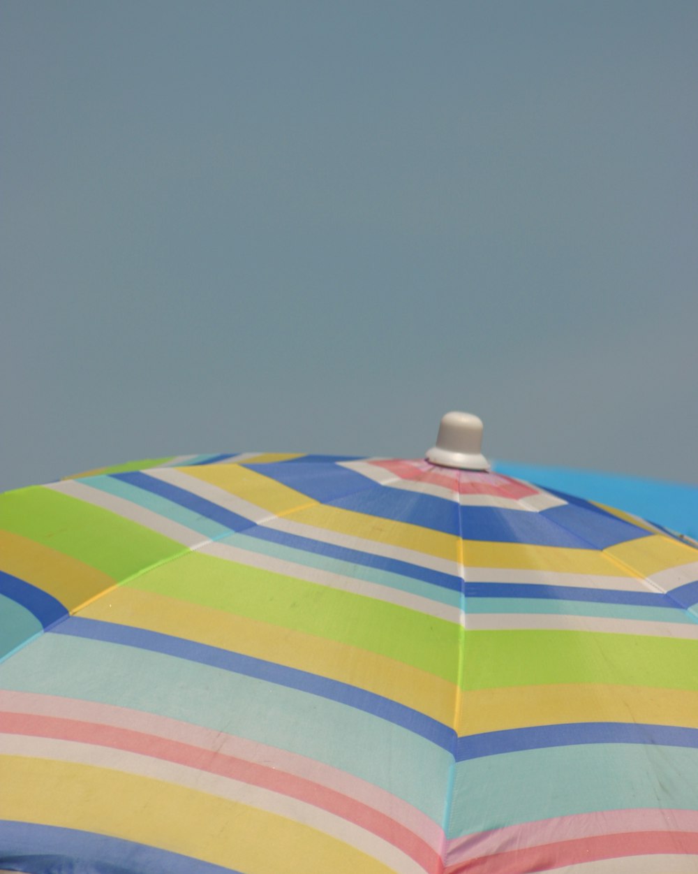 a colorful umbrella with a light on top