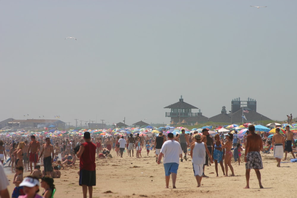 a large crowd of people at a beach