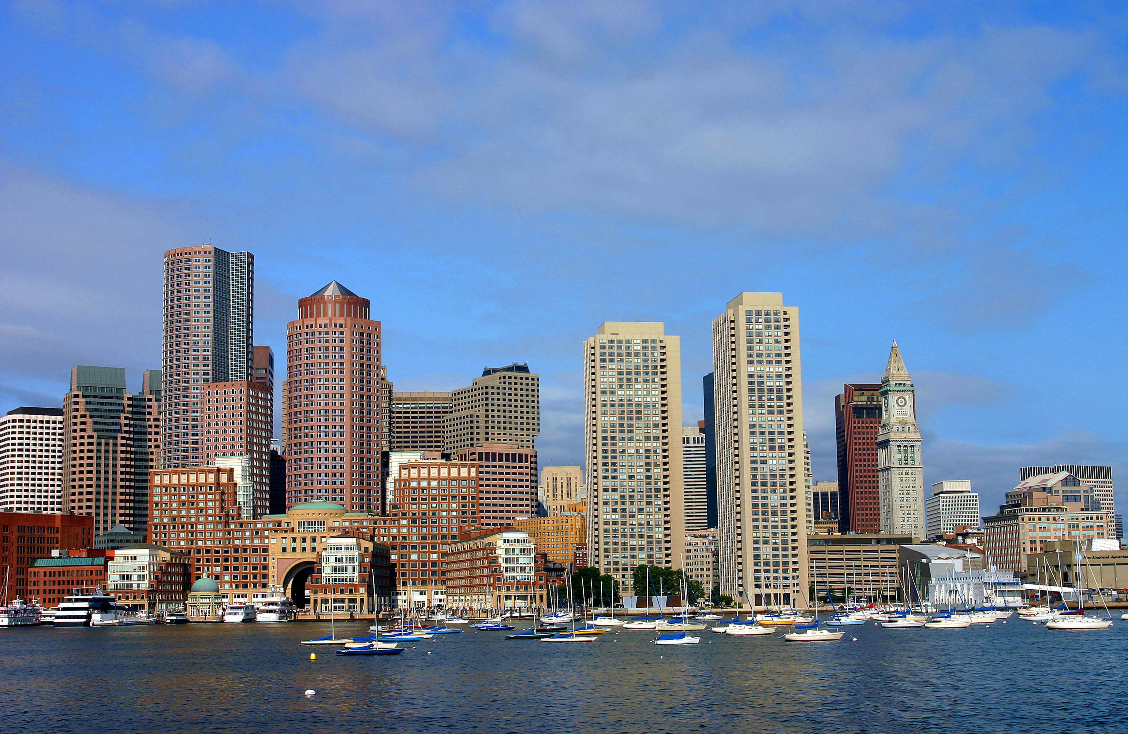 a city skyline with boats, 
