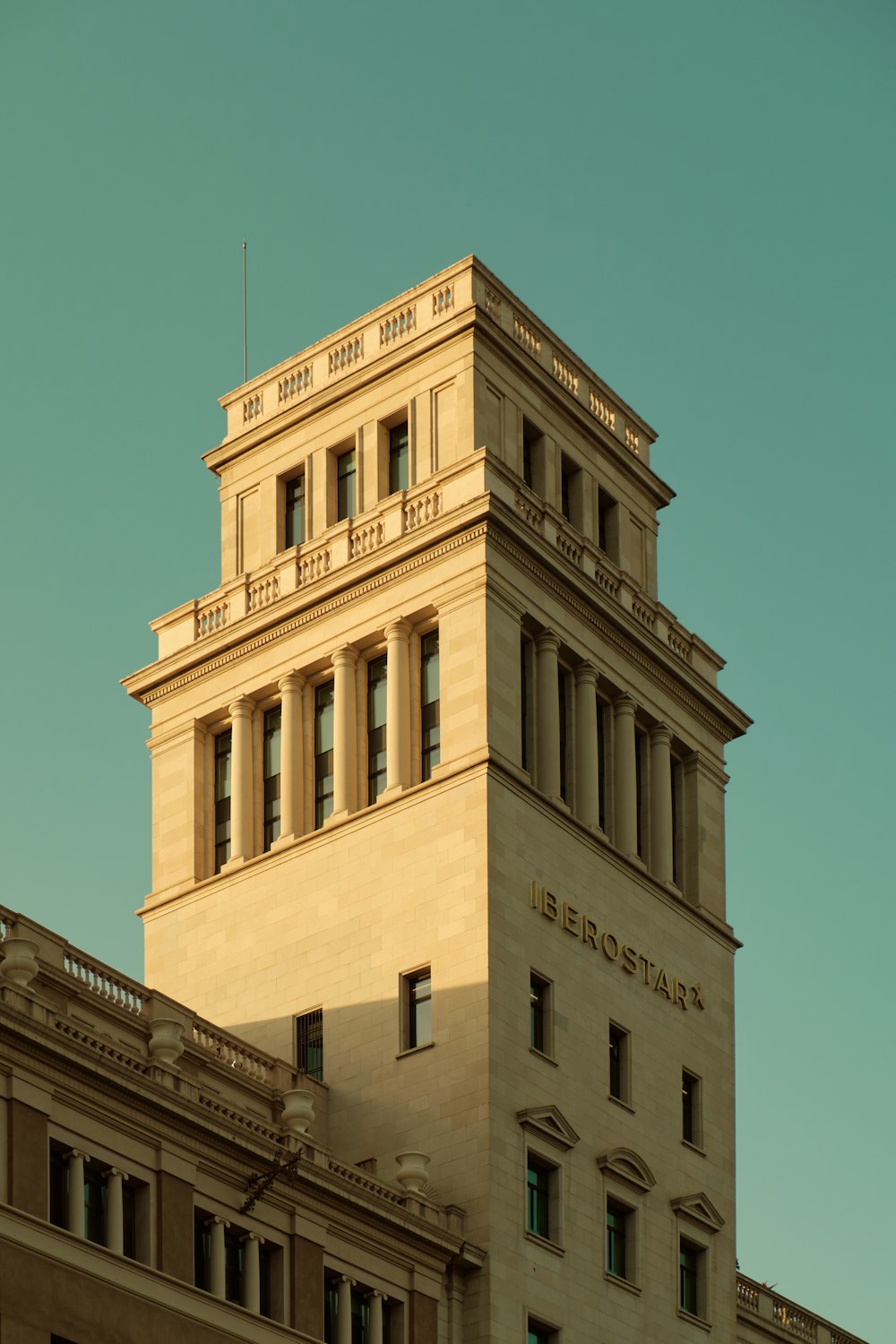 a tall building with a sign on it