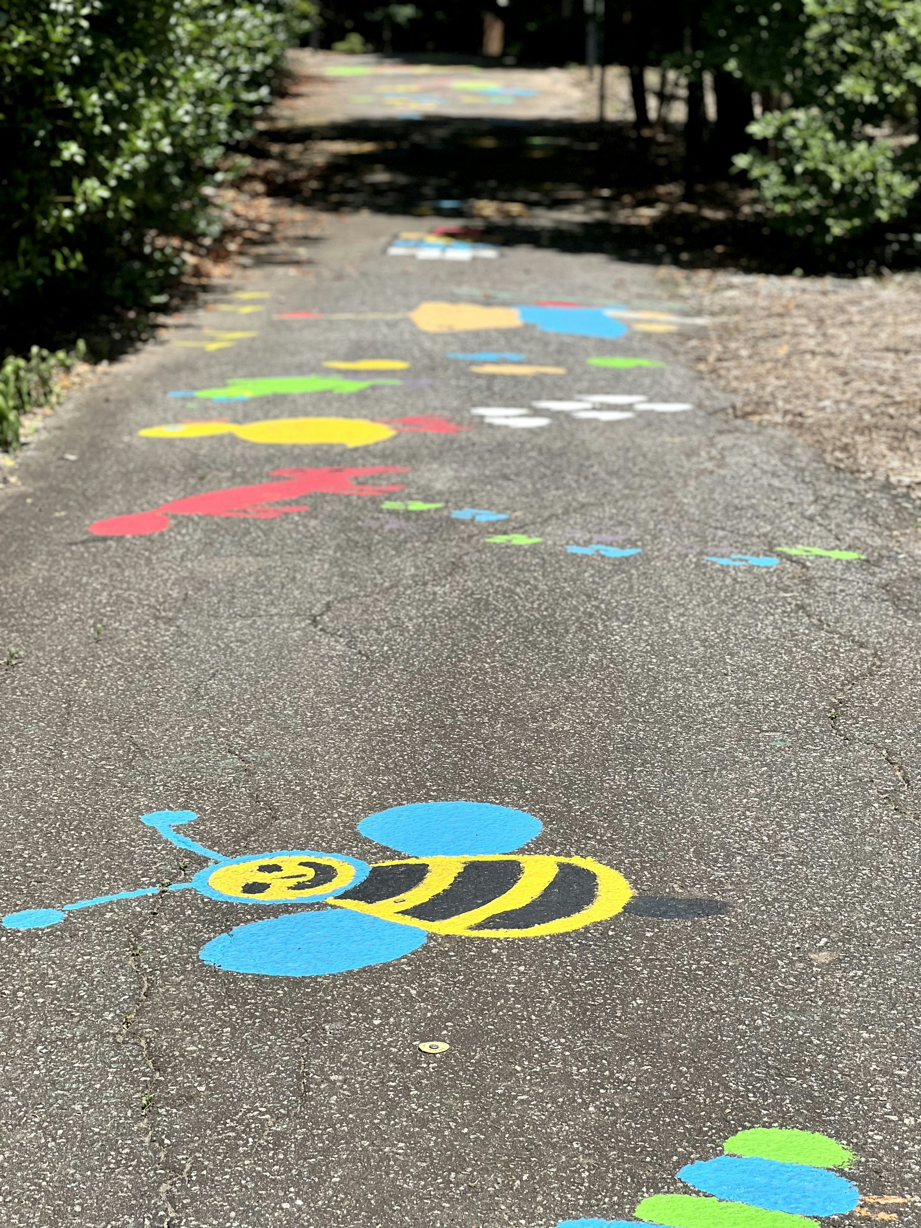 a sidewalk with painted lines
