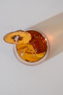 a glass jar with a brown substance