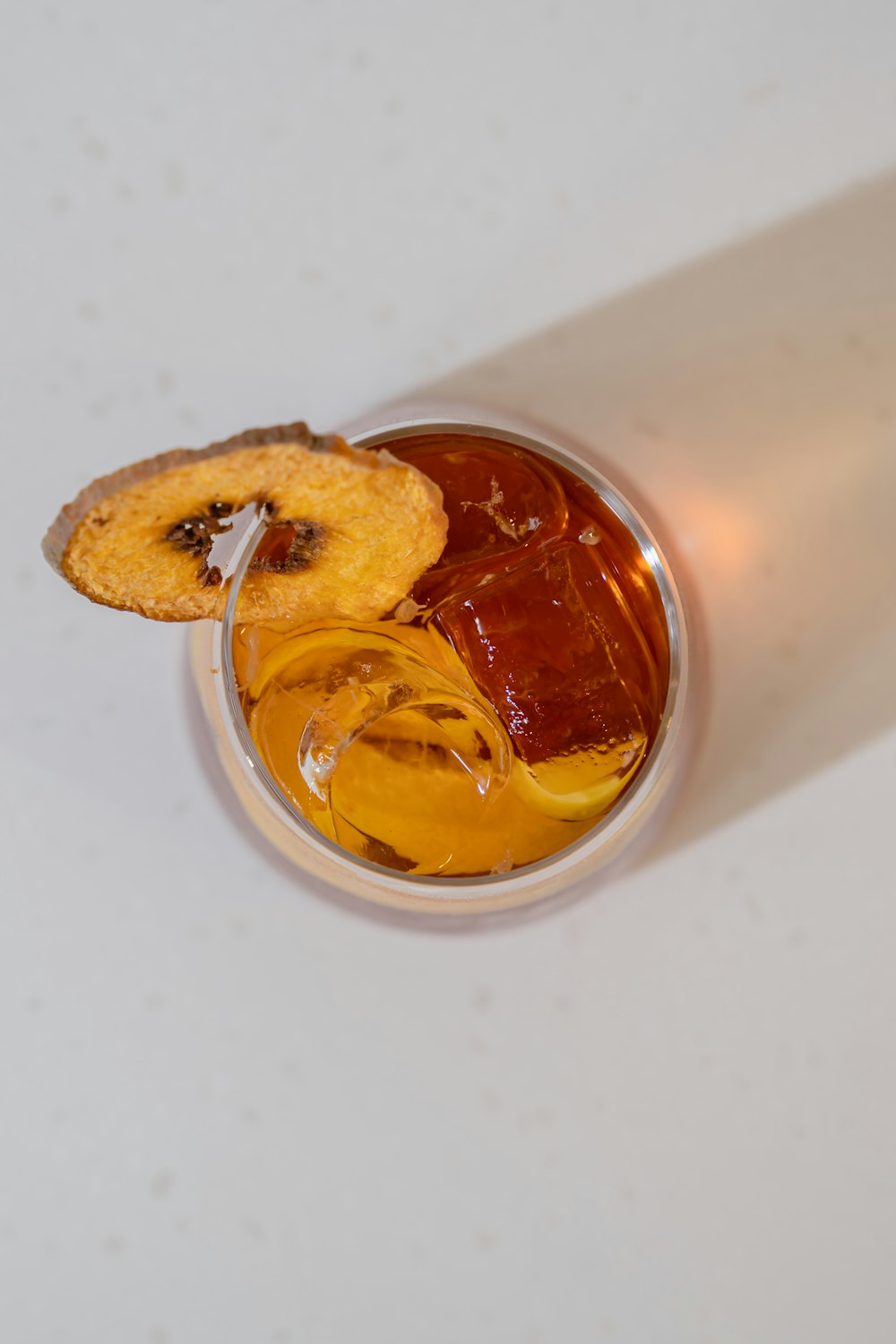 a glass jar with a brown substance