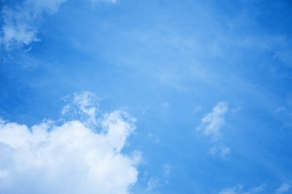 a blue sky with white clouds