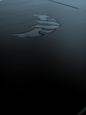 A sleek, modern detective office with a dark theme and golden accents, reflecting professionalism and discretion.