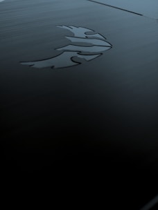 A sleek registration form on a dark futuristic interface with blue and gold accents.