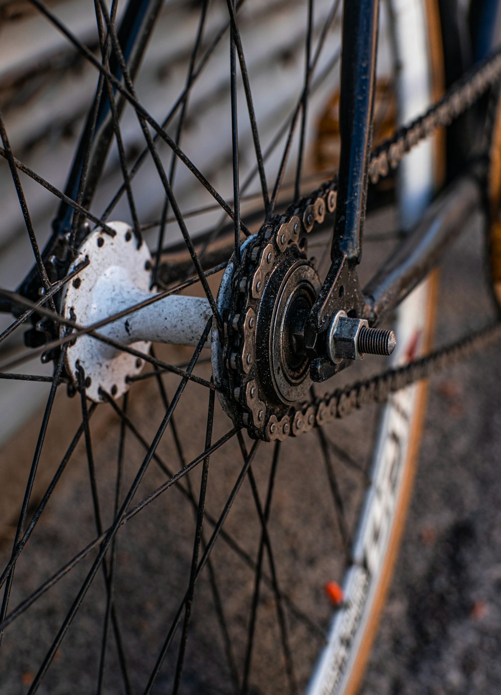 a bicycle wheel with a white object on it