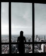 a person looking out a window