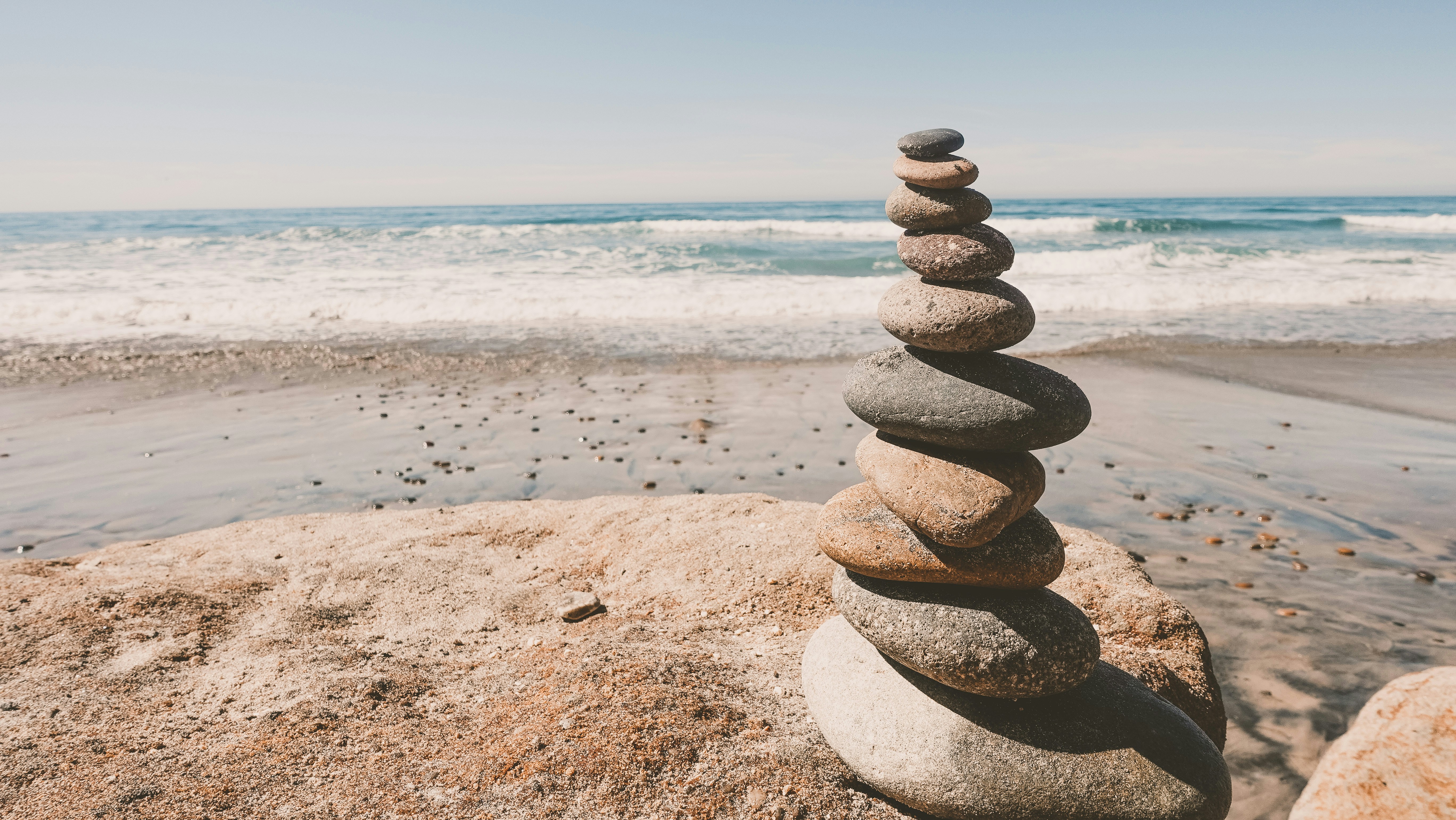 a stack of rocks on a beach