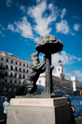 a statue of the Bear and the Strawberry Tree in Madrid