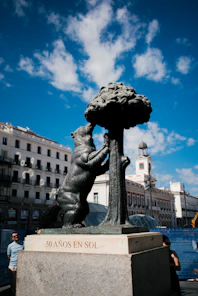 a statue of the Bear and the Strawberry Tree in Madrid