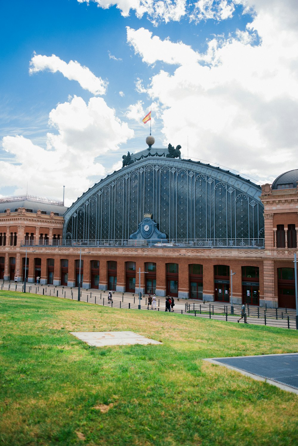 a large building with a flag on top