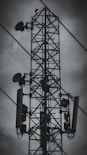 a large tower with a wire attached