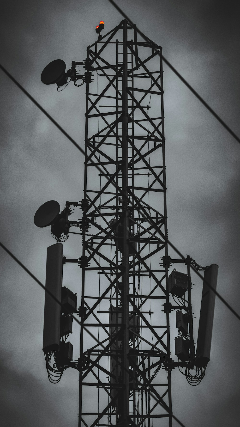 a large tower with a wire attached