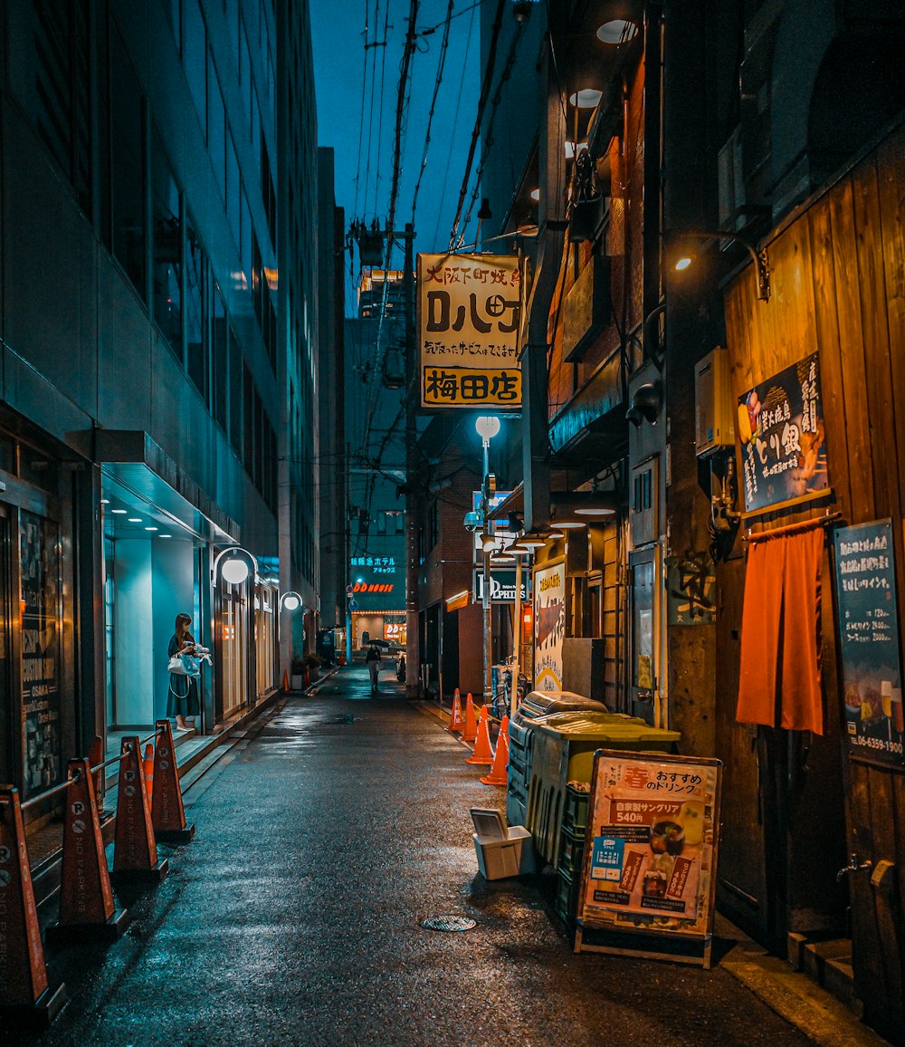 a street with signs and lights