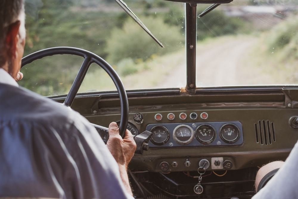 a man driving a car