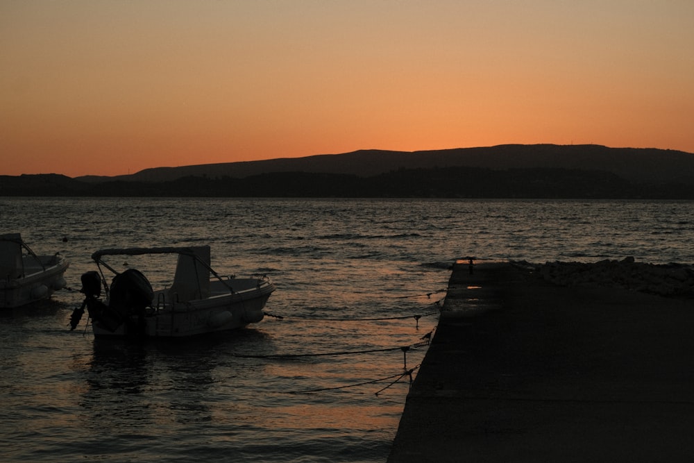 a boat sits in the water