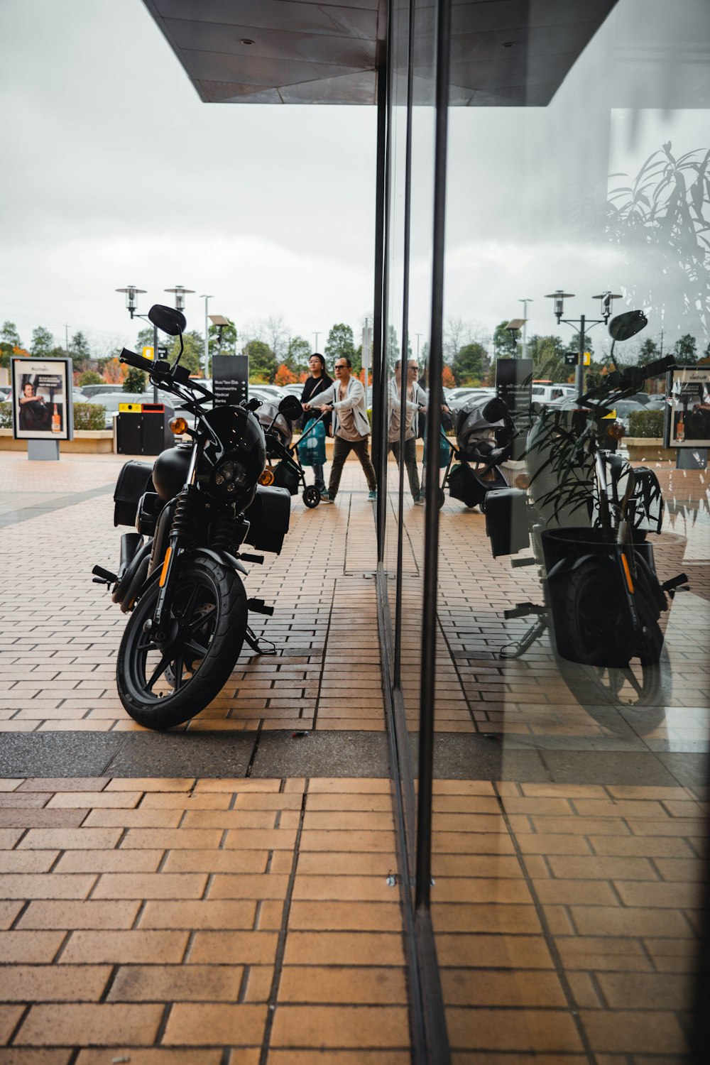 a motorcycle parked on a sidewalk