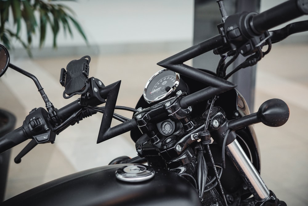 a black motorcycle with a black handlebar