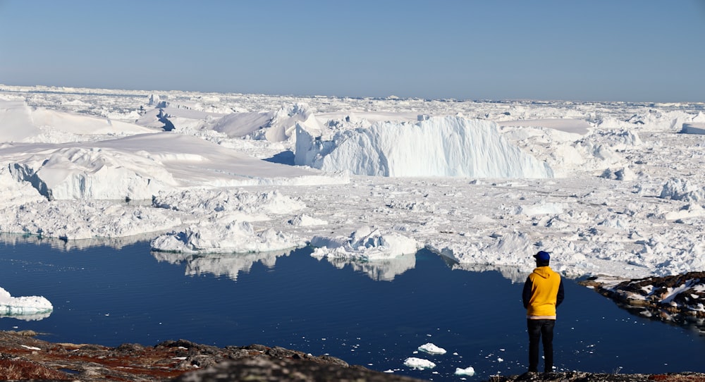 a person standing on a snowy mountain