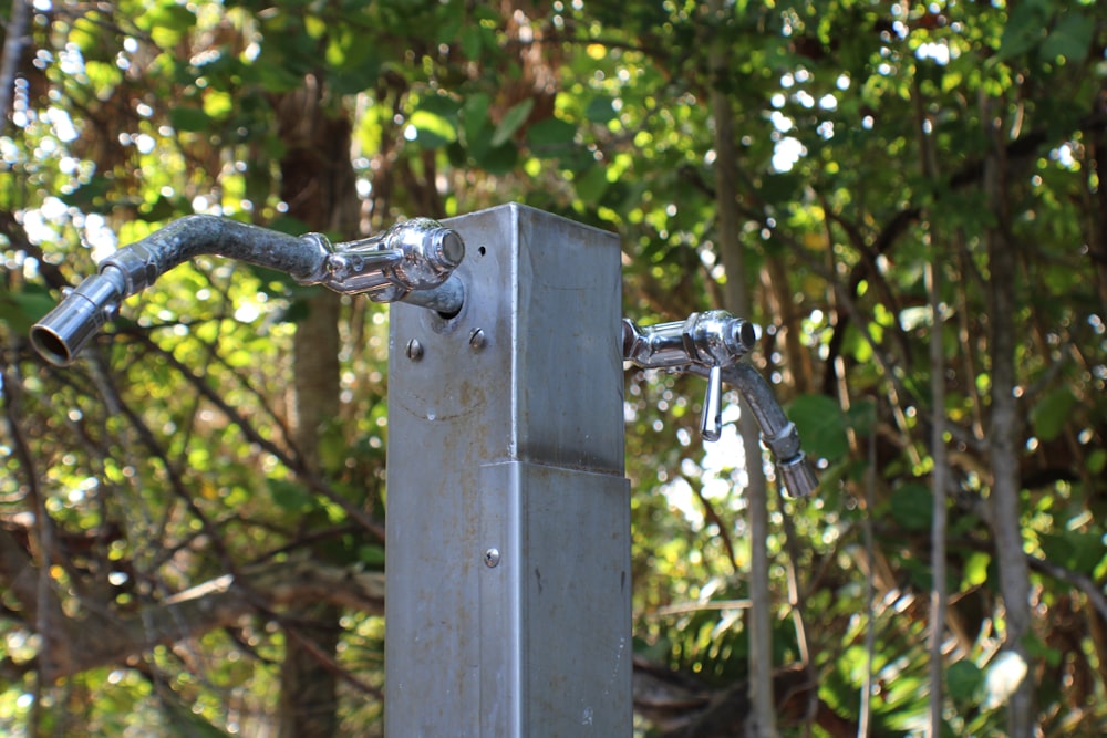 a metal pole with a metal rod attached to it