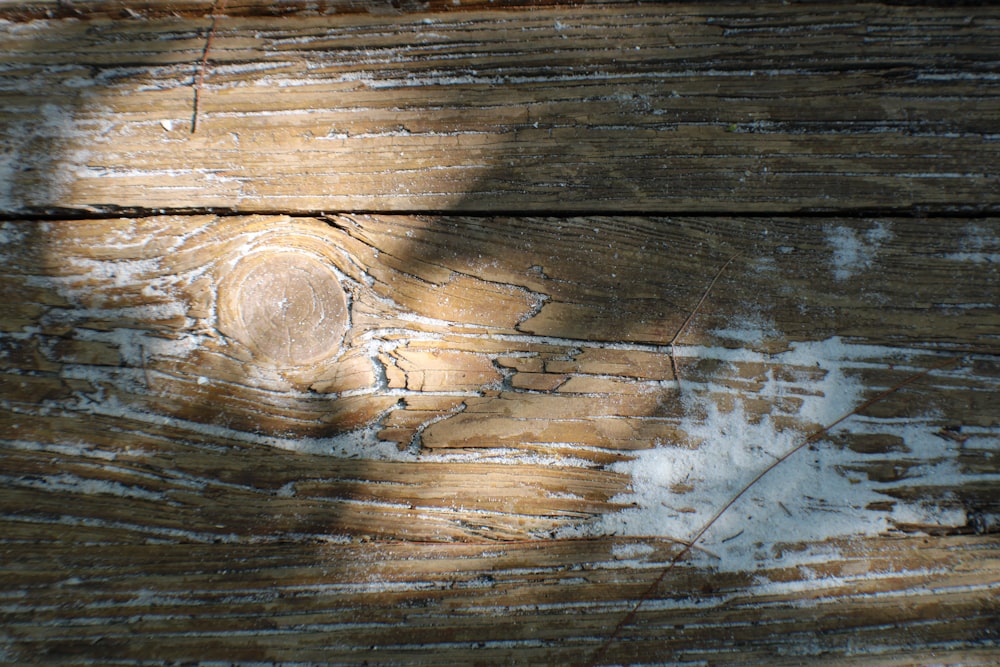 a wood surface with a design