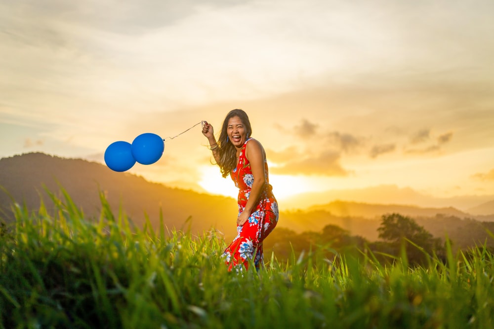 a person holding balloons