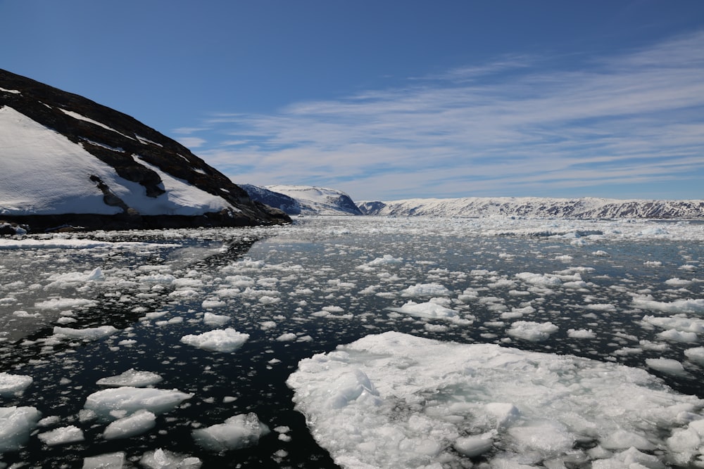 a snowy landscape with mountains