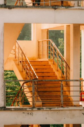 Well-maintained staircase with polished handrails in a residential building