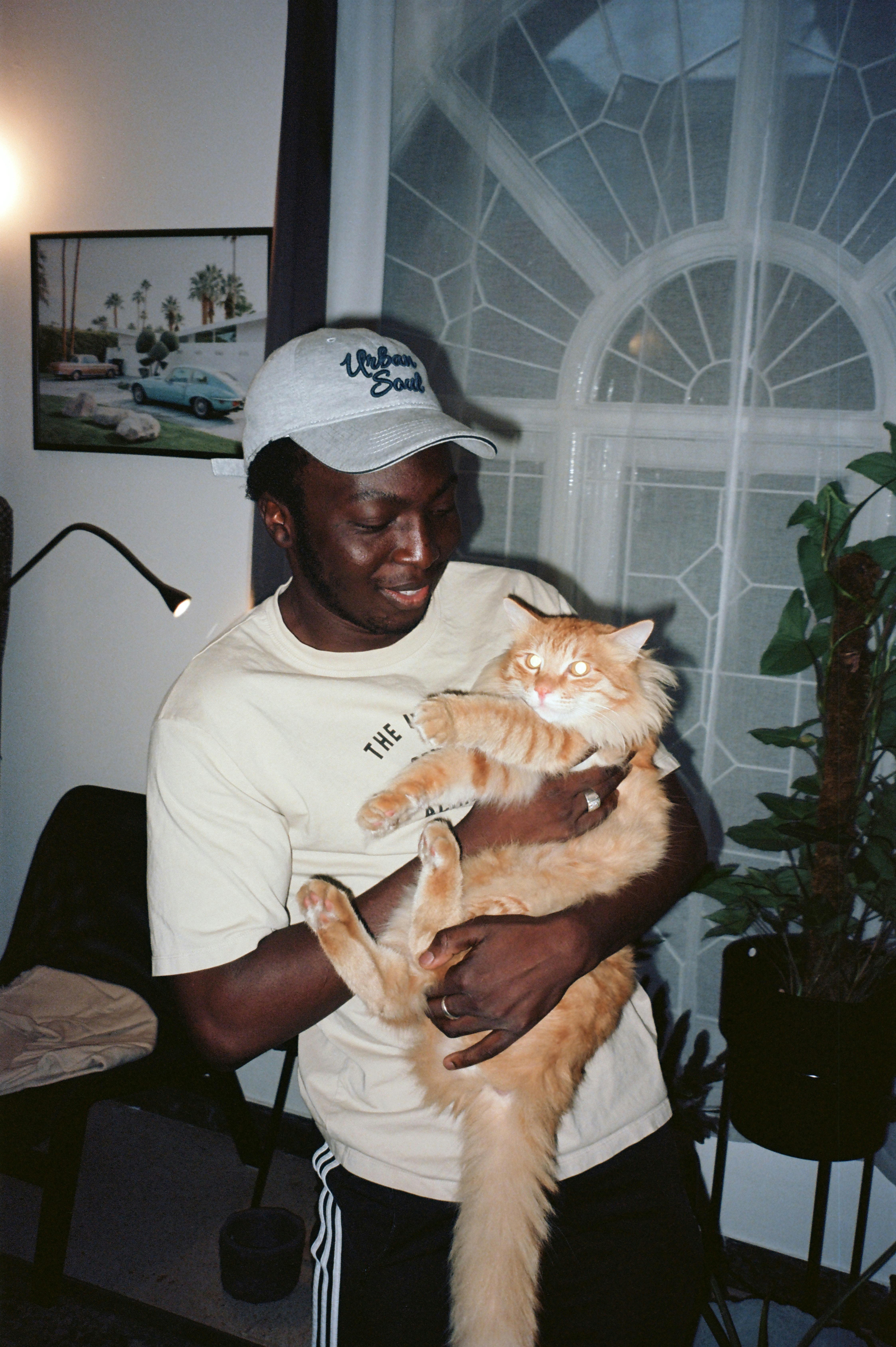 a man holding a cat
