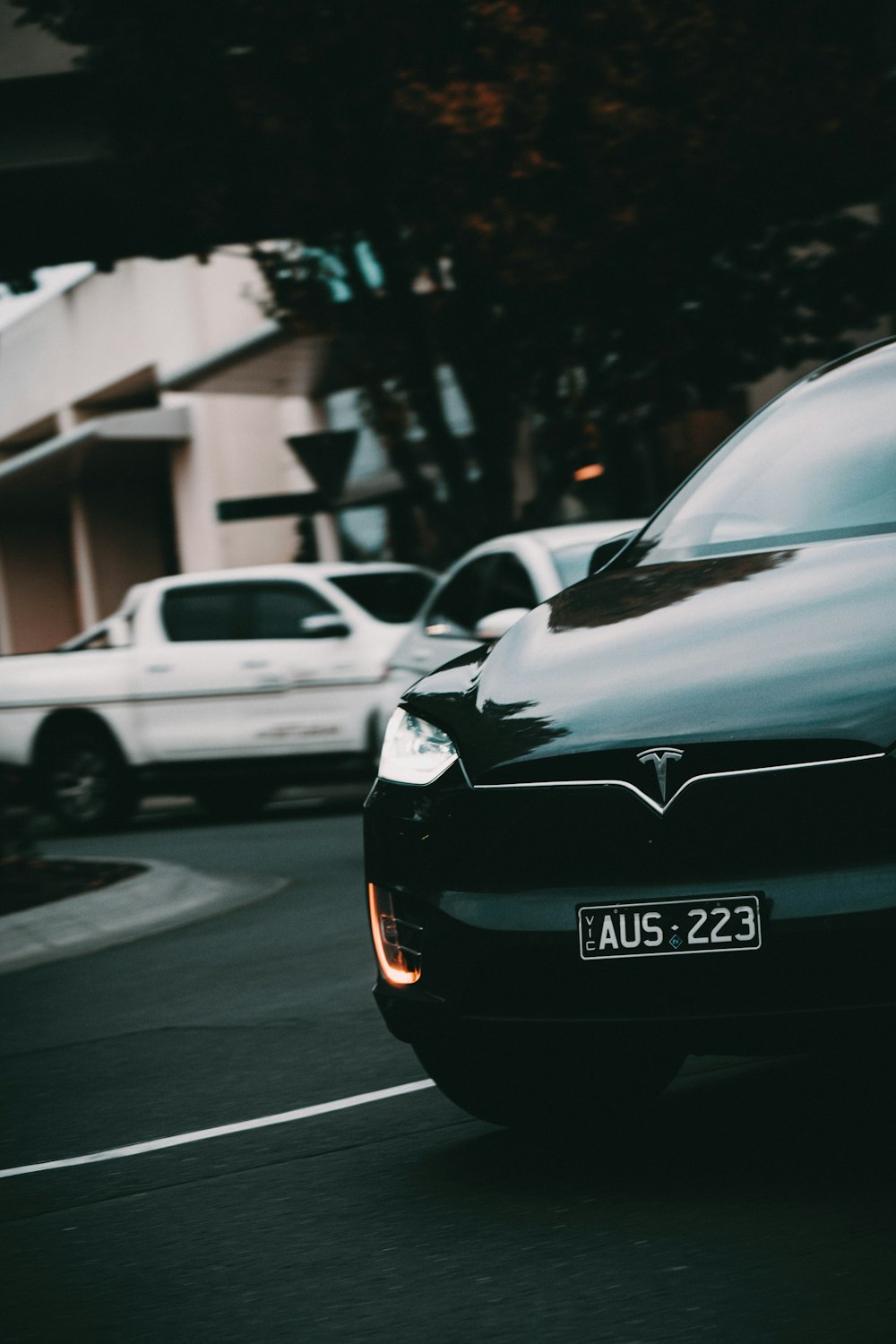 cars parked on the side of a road