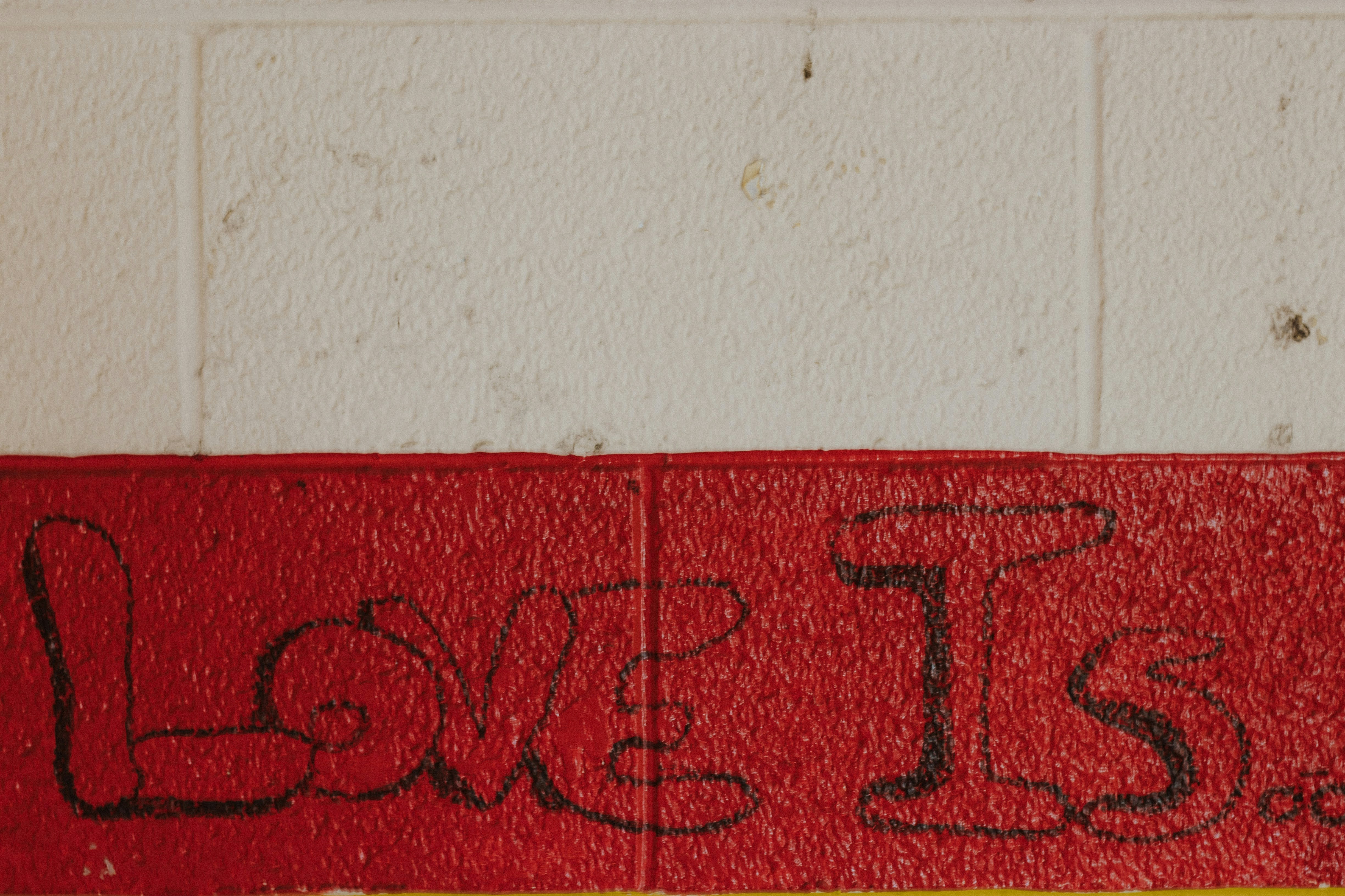 a red sign with black text