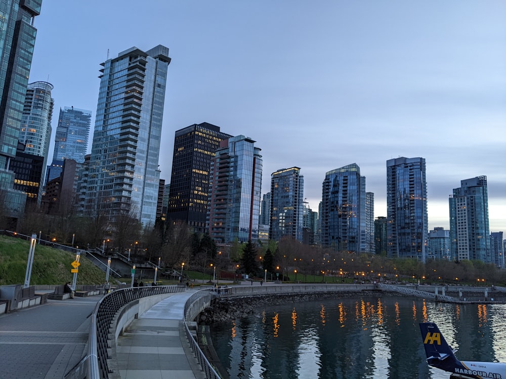 a city skyline with a river