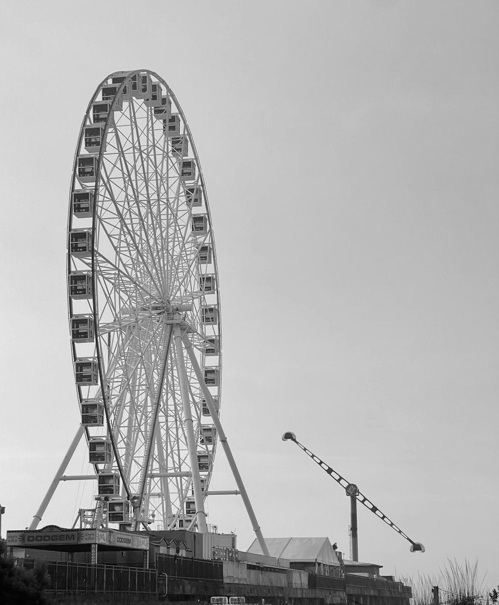 a ferris wheel with a crane