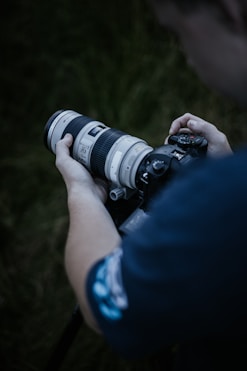 a person holding a camera
