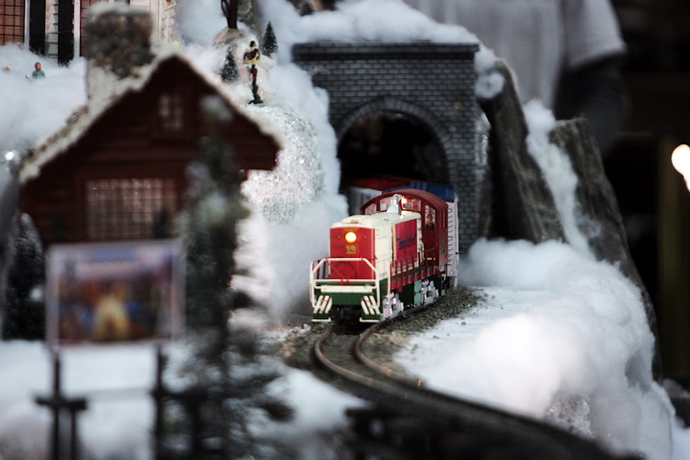 a toy train going through a tunnel