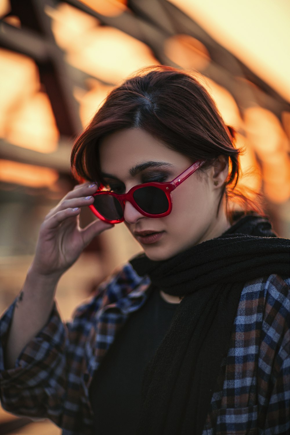 a person wearing red sunglasses