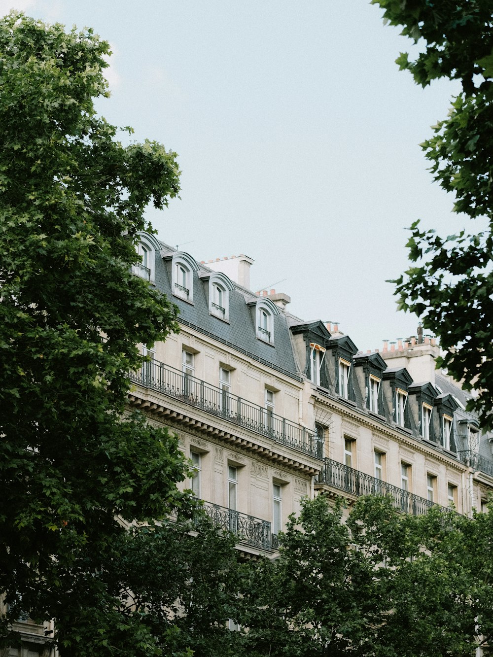 a building with trees in front of it