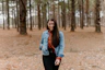 a person standing in a forest